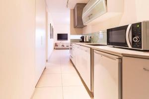 Køkken eller tekøkken på close to the hilton with balcony + 8 billeder