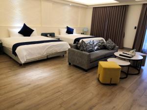 Katil atau katil-katil dalam bilik di Shange Beach Club Homeatay