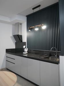 Kuchnia lub aneks kuchenny w obiekcie Apartamento Turistico Hermanos Infantes