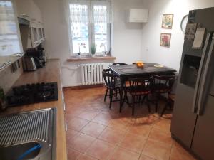 Kuchyňa alebo kuchynka v ubytovaní Apartament Mazurski