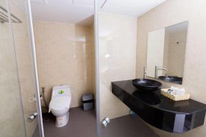 Koupelna v ubytování Royal Asia Hotel Pratunam