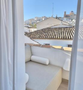 a balcony with a view of a roof at Hotel Abaco Altea in Altea