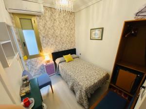 Postel nebo postele na pokoji v ubytování Pensión Antonio Guesthouse