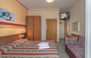 Postel nebo postele na pokoji v ubytování Hotel Dolly