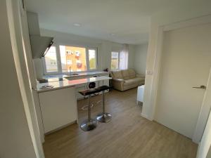 A seating area at Acogedor Apartamento en zona privilegiada