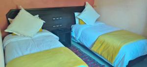 Postel nebo postele na pokoji v ubytování Auberge Tourtite