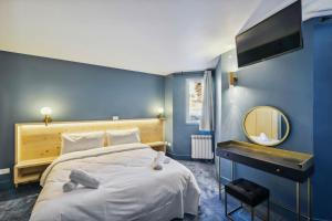 Voodi või voodid majutusasutuse HOTEL TURAN toas