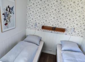 En eller flere senge i et værelse på BLÅBJERGGAARD - Hennebysvej 60
