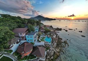 an aerial view of a resort on the water at DD Hut Koh Tao in Koh Tao