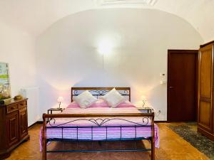 Postel nebo postele na pokoji v ubytování BORGO CAMILLO