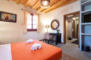 A bed or beds in a room at Lively Lofts by The Varos Residences