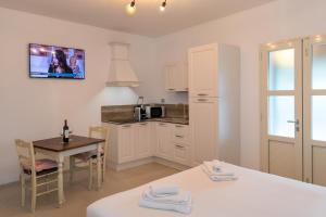 Kuchyňa alebo kuchynka v ubytovaní Garden Relais Le Fontanelle