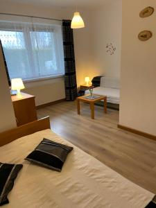 Postel nebo postele na pokoji v ubytování Hołcyna 21