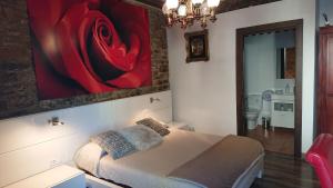 Postel nebo postele na pokoji v ubytování La Pata de Oca Hostal Rural y Albergue