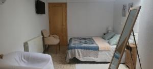 Postel nebo postele na pokoji v ubytování Casa Gracia