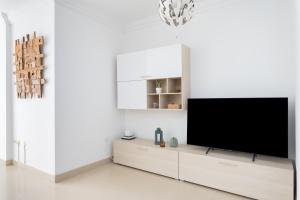 TV a/nebo společenská místnost v ubytování Home2Book Amazing Views Dúplex Dos Hermanos