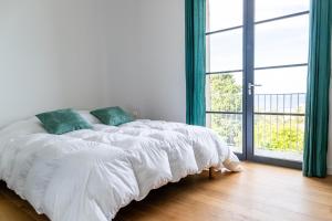 Posteľ alebo postele v izbe v ubytovaní Villa HUGO, Neuve, 8 pers, pisc chauffée, + 12 fotografií