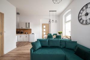 Kuchyňa alebo kuchynka v ubytovaní Apartamenty u Bratków