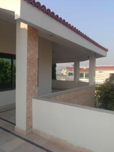 a view from the outside of a house at Impeccable 4-Bed Villa in Mirpur azad khasmir in Pothi