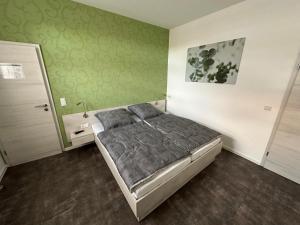 Postel nebo postele na pokoji v ubytování Pension Am Stadtrand Zerbst
