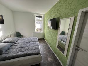 Postel nebo postele na pokoji v ubytování Pension Am Stadtrand Zerbst