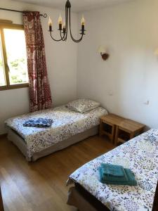 Posteľ alebo postele v izbe v ubytovaní Appartement tout confort - Belle vue sur le Cambre d'Aze