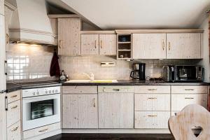 Kuchyň nebo kuchyňský kout v ubytování Seelenruhe