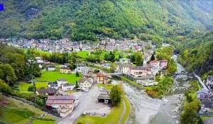 an aerial view of a town next to a river at Cà Maria in Bignasco