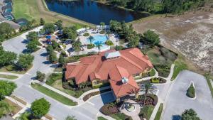 an overhead view of a house with a swimming pool at Casa Amore at Ellis Exclusive Villas in Davenport
