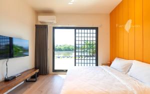Postel nebo postele na pokoji v ubytování 好室一庒House in field宜蘭獨棟平房民宿 可包棟