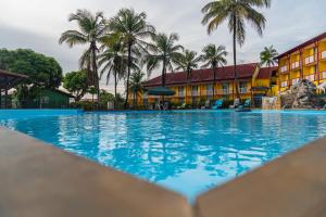 Der Swimmingpool an oder in der Nähe von L'Hôtel Du Fleuve
