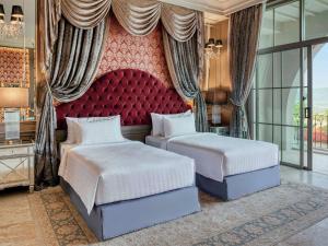 Llit o llits en una habitació de Mövenpick Resort Khao Yai