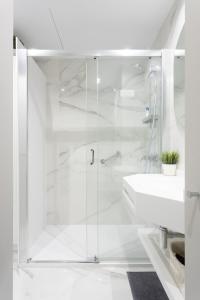 A bathroom at Home2Book Olympo Suite Még 29 kép