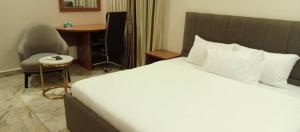 Postel nebo postele na pokoji v ubytování Fahrenheit Apartments