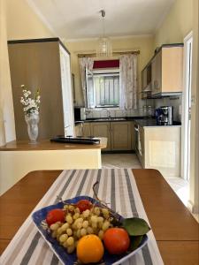 A kitchen or kitchenette at Ria Apartments