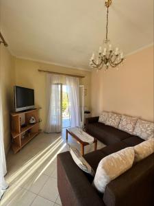 A television and/or entertainment centre at Ria Apartments