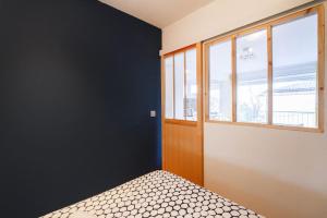 Posteľ alebo postele v izbe v ubytovaní double appartement, saint michel, parking, wifi