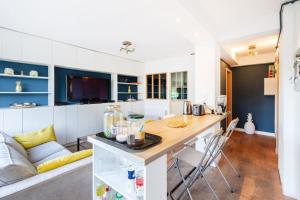 Kuchyňa alebo kuchynka v ubytovaní double appartement, saint michel, parking, wifi