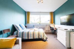 Televízia a/alebo spoločenská miestnosť v ubytovaní double appartement, saint michel, parking, wifi