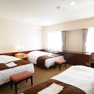 Postel nebo postele na pokoji v ubytování Niigata Toei Hotel + 37 fotografií