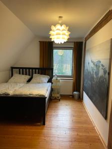 Postel nebo postele na pokoji v ubytování Ferienwohnung Varus