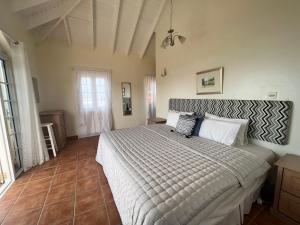 Vuode tai vuoteita majoituspaikassa Stunning 4-Bed Villa in Gros Islet St Lucia