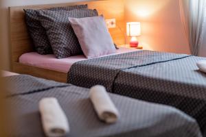 Łóżko lub łóżka w pokoju w obiekcie Holiday Home Aria