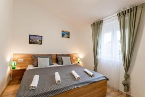 Łóżko lub łóżka w pokoju w obiekcie Holiday Home Aria