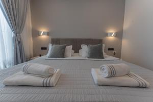 Postel nebo postele na pokoji v ubytování Sky & Sun Luxury Rooms with private parking in the garage