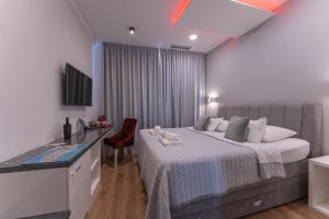 Postel nebo postele na pokoji v ubytování Sky & Sun Luxury Rooms with private parking in the garage