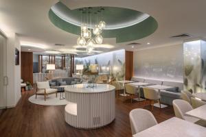 Posezení v ubytování Melia Lisboa Oriente Hotel