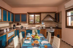 Η κουζίνα ή μικρή κουζίνα στο Villa Greco