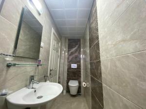 Ein Badezimmer in der Unterkunft Vesta Apart Hotel