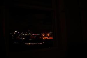 a view of a city at night from a window at Cozy apartment 3rd 10min Walk Downtown and City View in Providence